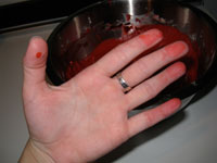red stained hands
