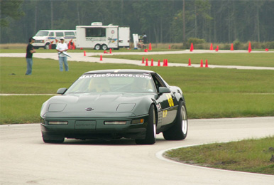 A Corvette taking a corner at the Test and Training Road Course