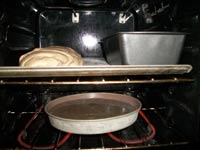 This is what you would want your oven to look like: a pan of boiling water at the bottom and the dough on the middle rack.
