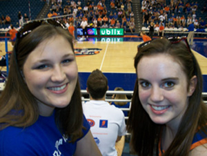 Dana, pictured left, with her friend, Jenny Squires, at a Gator volleyball game.