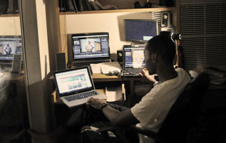 Photo of Harold Working on Computers