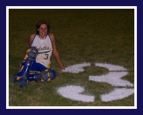 Me on softball field flexing