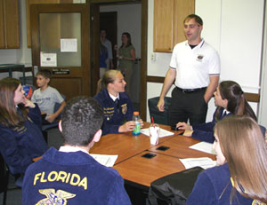 CFFA memeber leading a group of high school FFA members