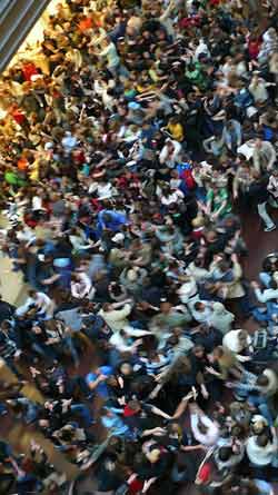 Crowded shopping mall or flash mob?