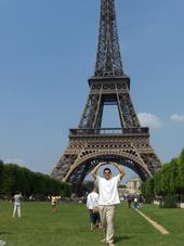 Me next to the Eiffel Tower in Paris, France